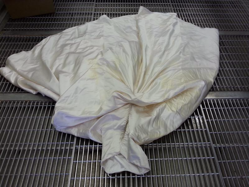 Wedding dress cleans by PetPeePee company from urine odor.