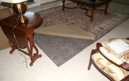 Rug underlay install under area rug customer home in Parkland Florida